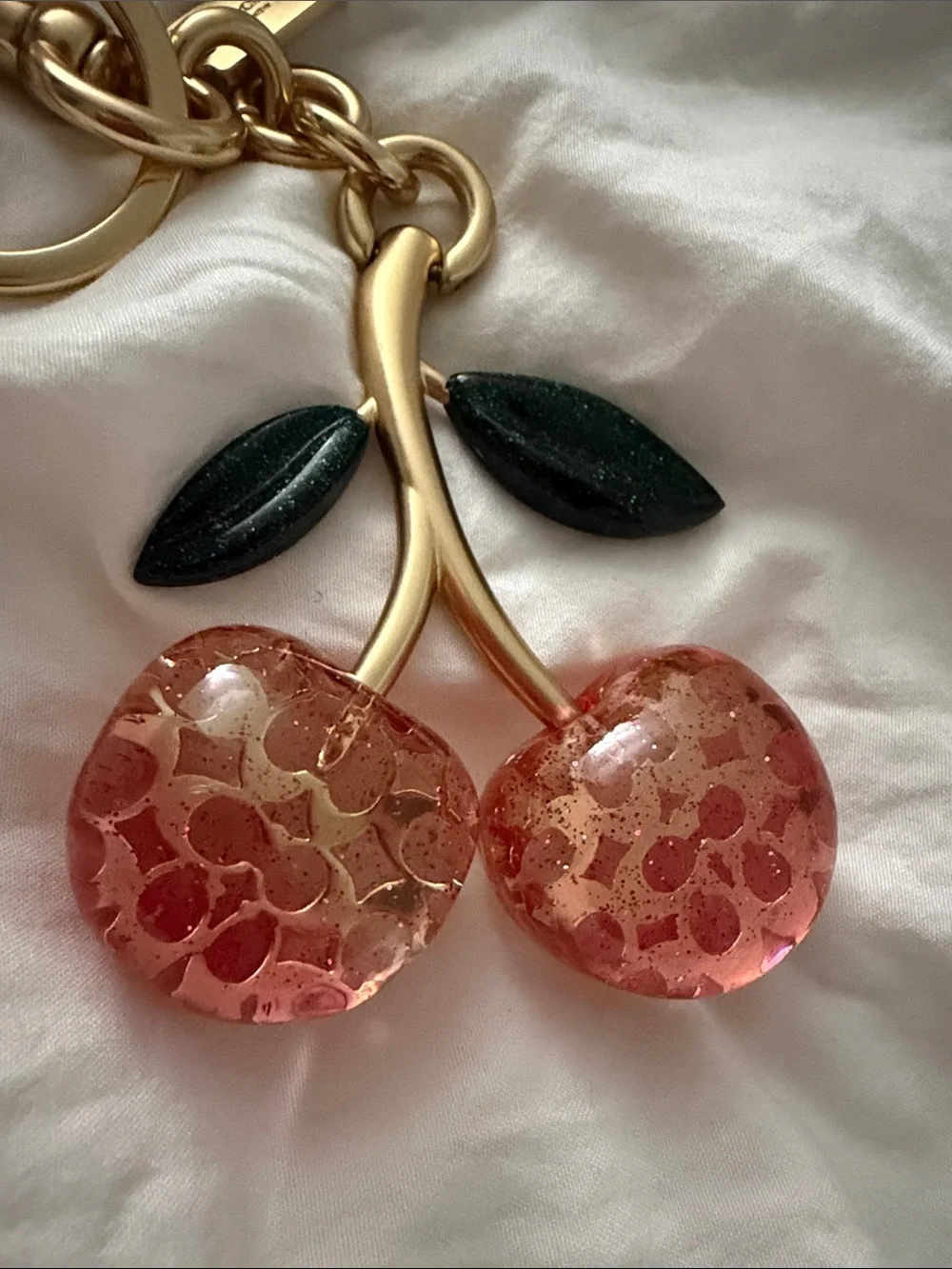 Coach Gold-Tone Pink Cherry Key Charm with Dark Green Leaves